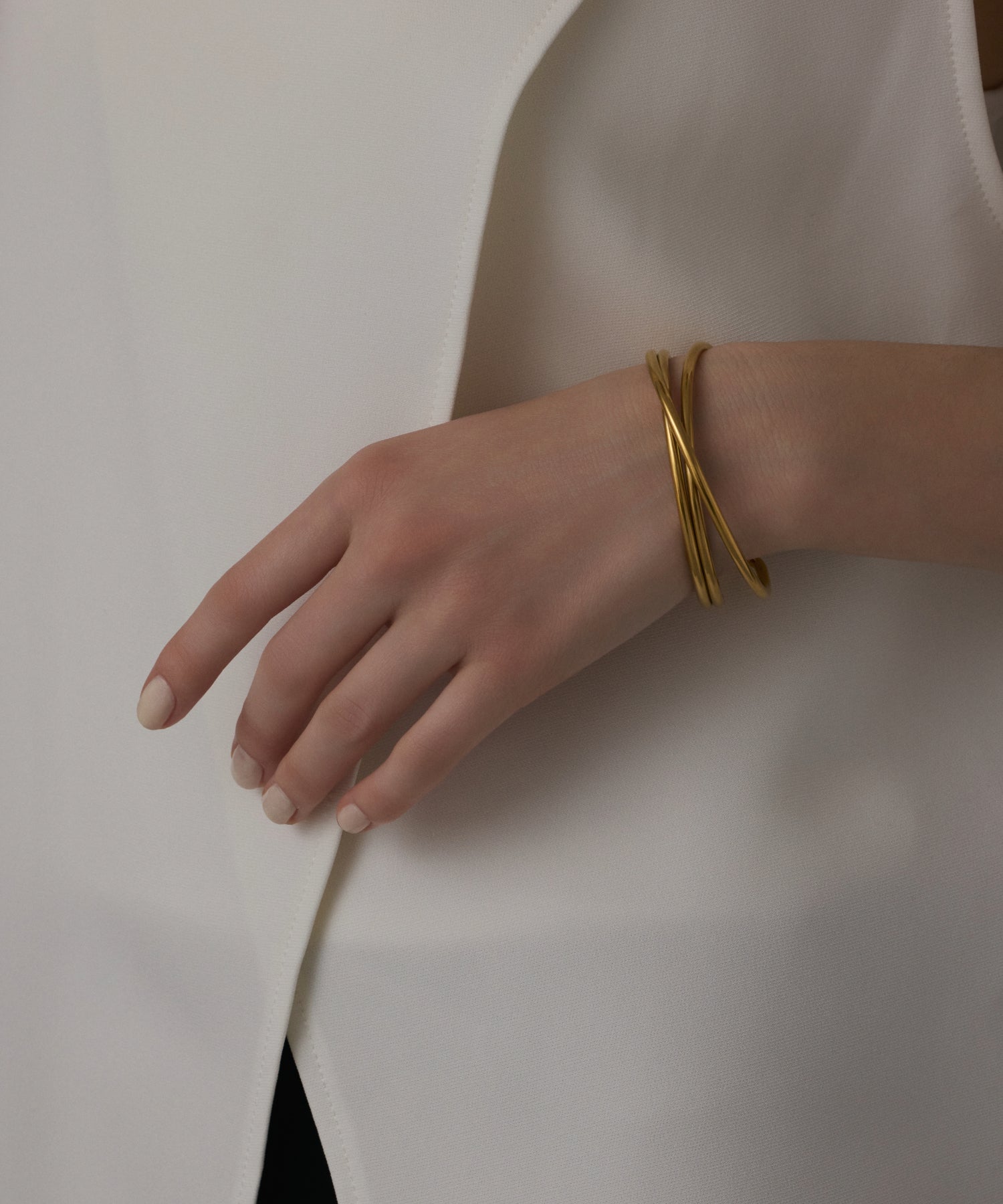 ゴールド]ツイストアーチバングル