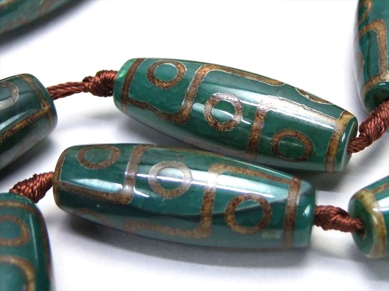 楽天市場】○龍の鱗模様【九眼緑龍紋天珠(くがんりゅうもんてんじゅ