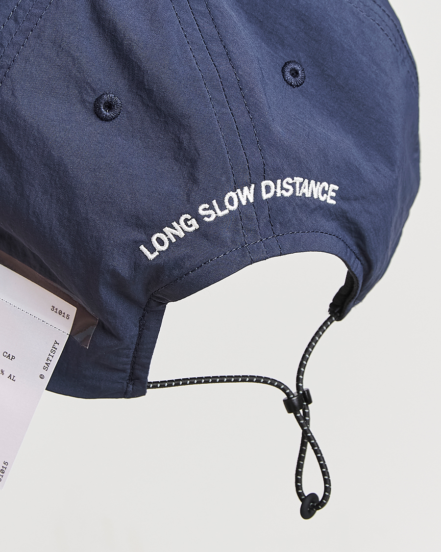 Satisfy FliteSilk Running Cap Navy at CareOfCarl.com