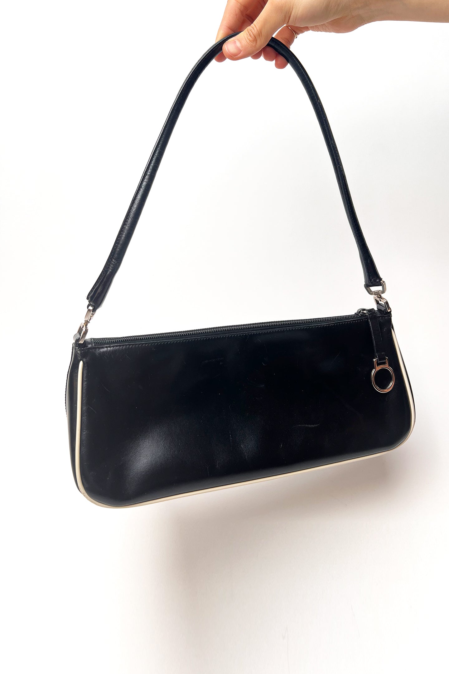 Vintage 2000s black Prada leather shoulder bag with white trims