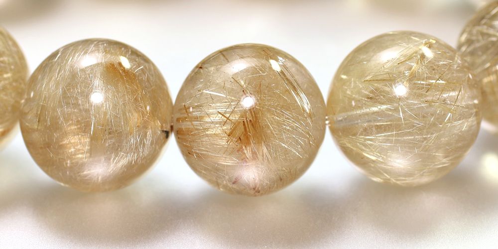 高品質]ゴールドルチルクォーツブレスレット（約17mm大玉！絹のような