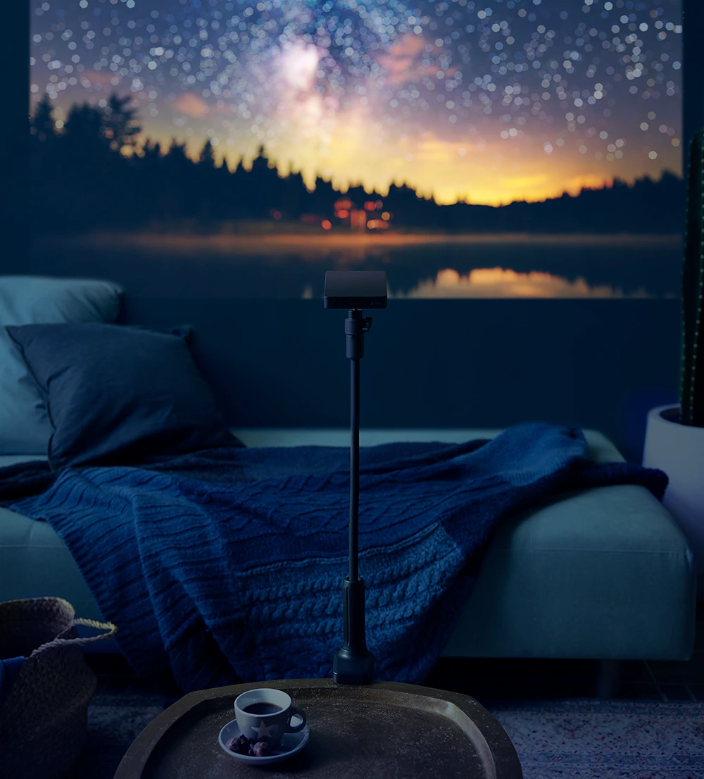 小型静音設計で自由に設置できるベッドルームプロジェクター | NX1