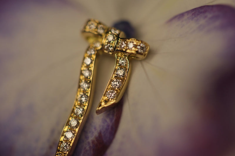 クアラントット Eleganza ピアス 片耳 リボン ダイヤ Eleganza