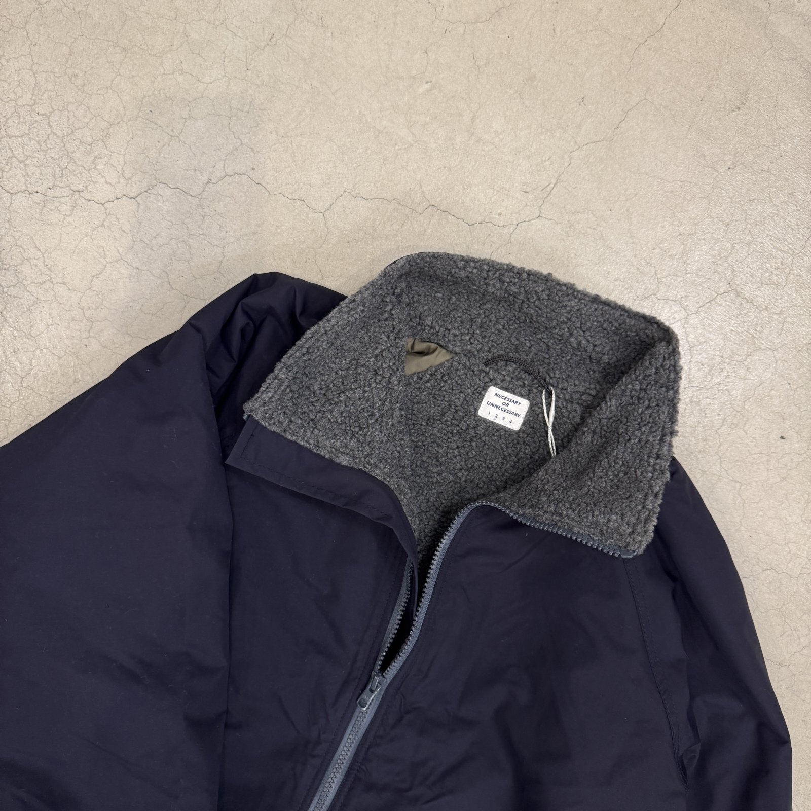 NECESSARY or UNNECESSARY- SQUALL JKT - the LOCAL STORE