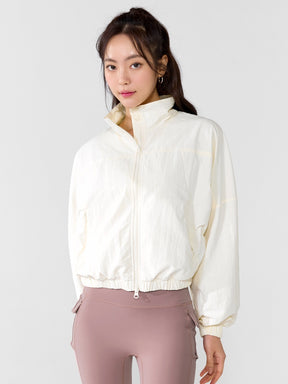 XTFJK08H4 ハイネック ドルマンスリーブ クロップド丈 ウィンドブレーカー