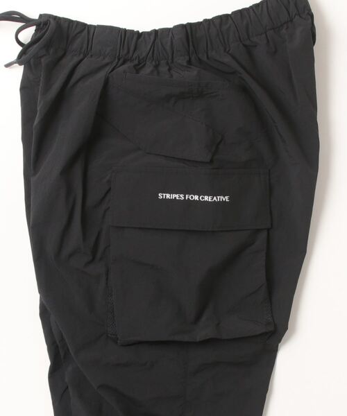 S.F.C（エスエフシー） カーゴパンツ S.F.C SUPER WIDE CARGO PANTS