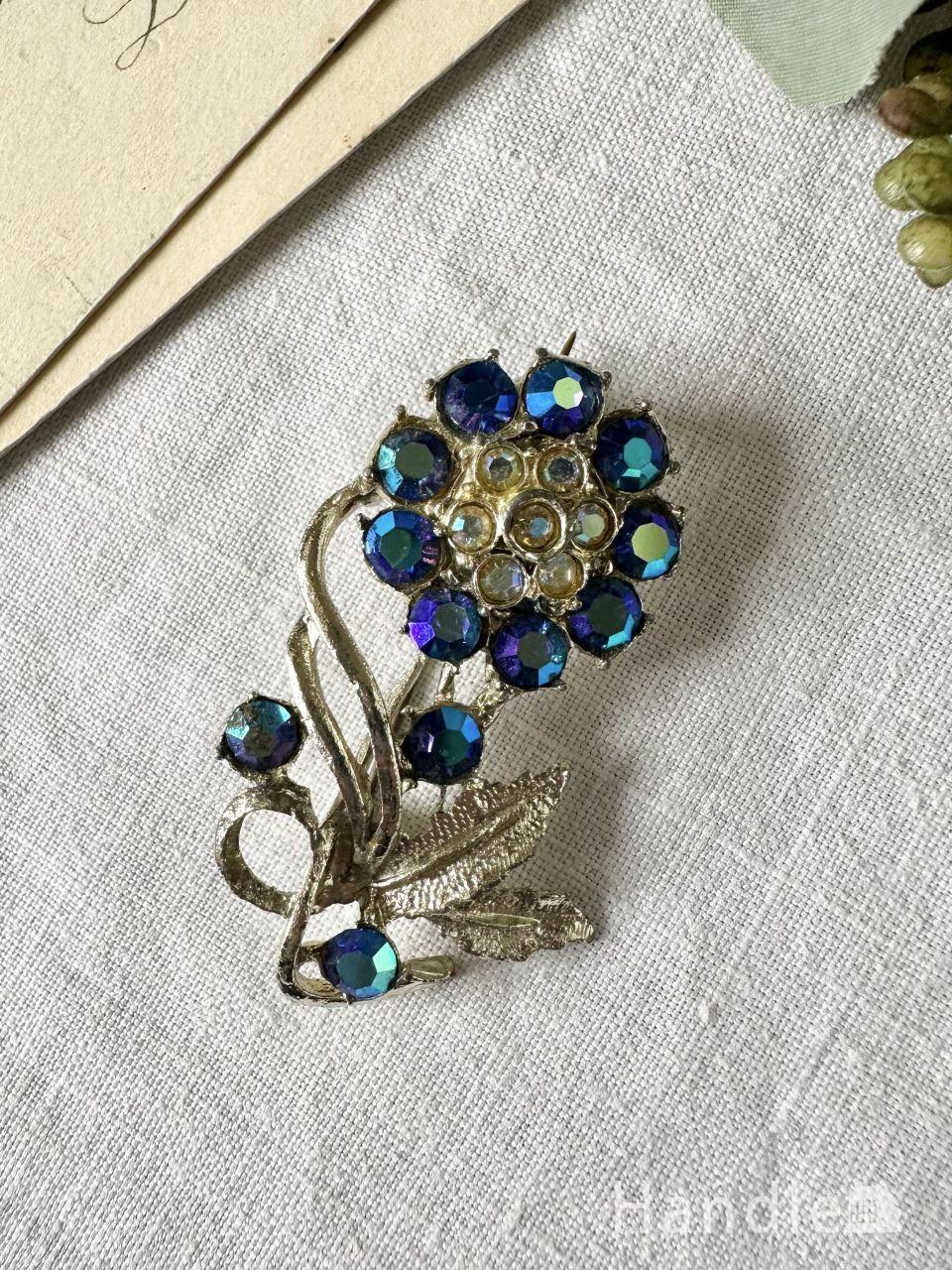 キラキラ輝くイギリスのビンテージアクセサリー、優雅に泳ぐ白鳥