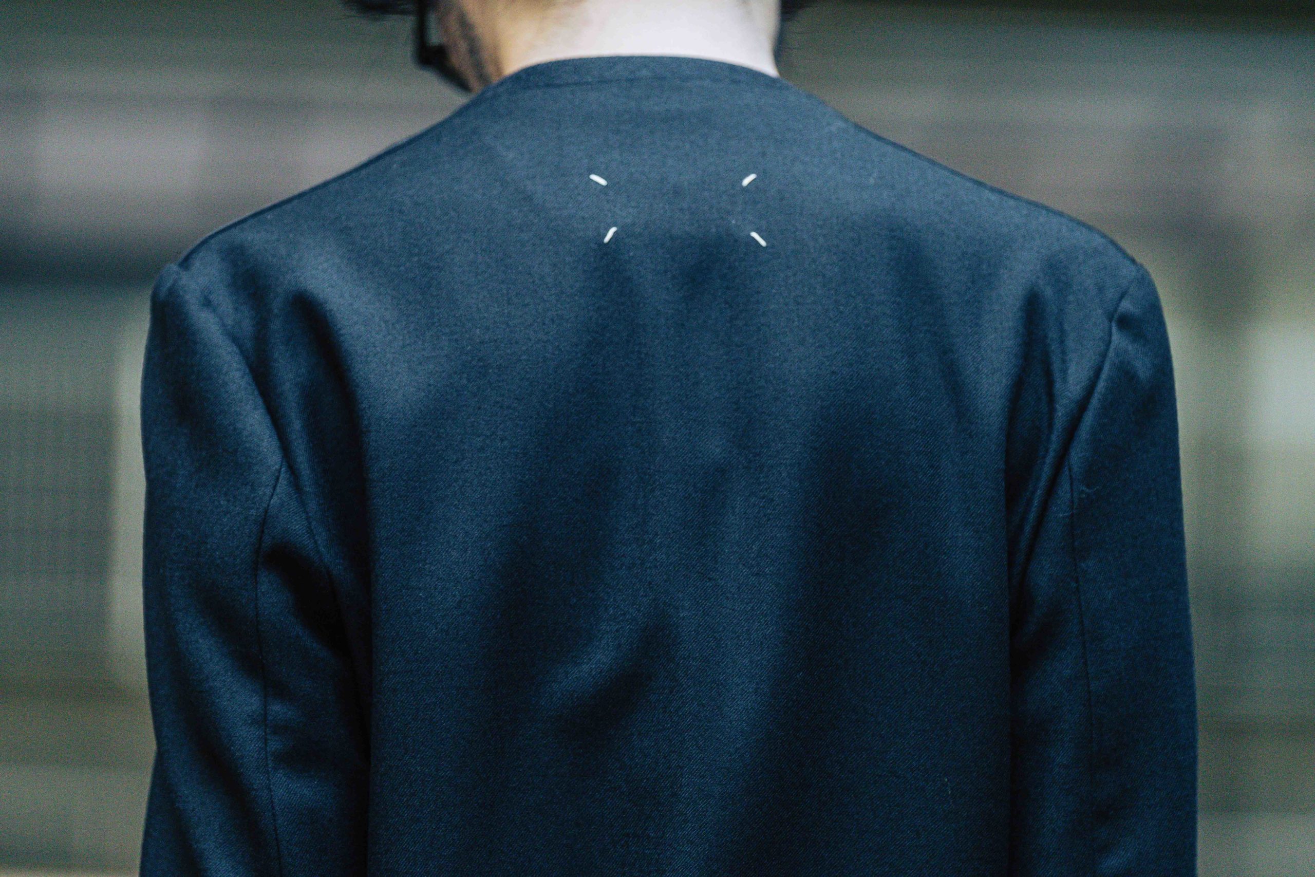 メゾンマルジェラのウールフランネル ノーカラージャケット | HUES