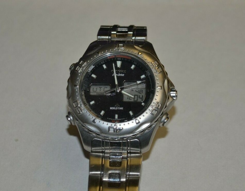 Citizen Eco Drive World Time Analog and Digital Display C-615 | eBay
