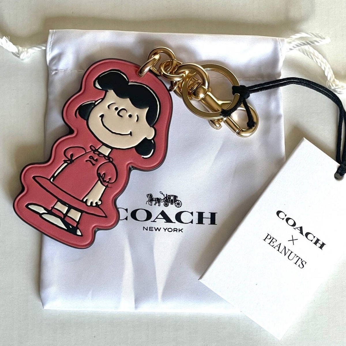 Coach x Peanuts 2025 Lucy Leather Bag Charm Keychain CBG58 Pink