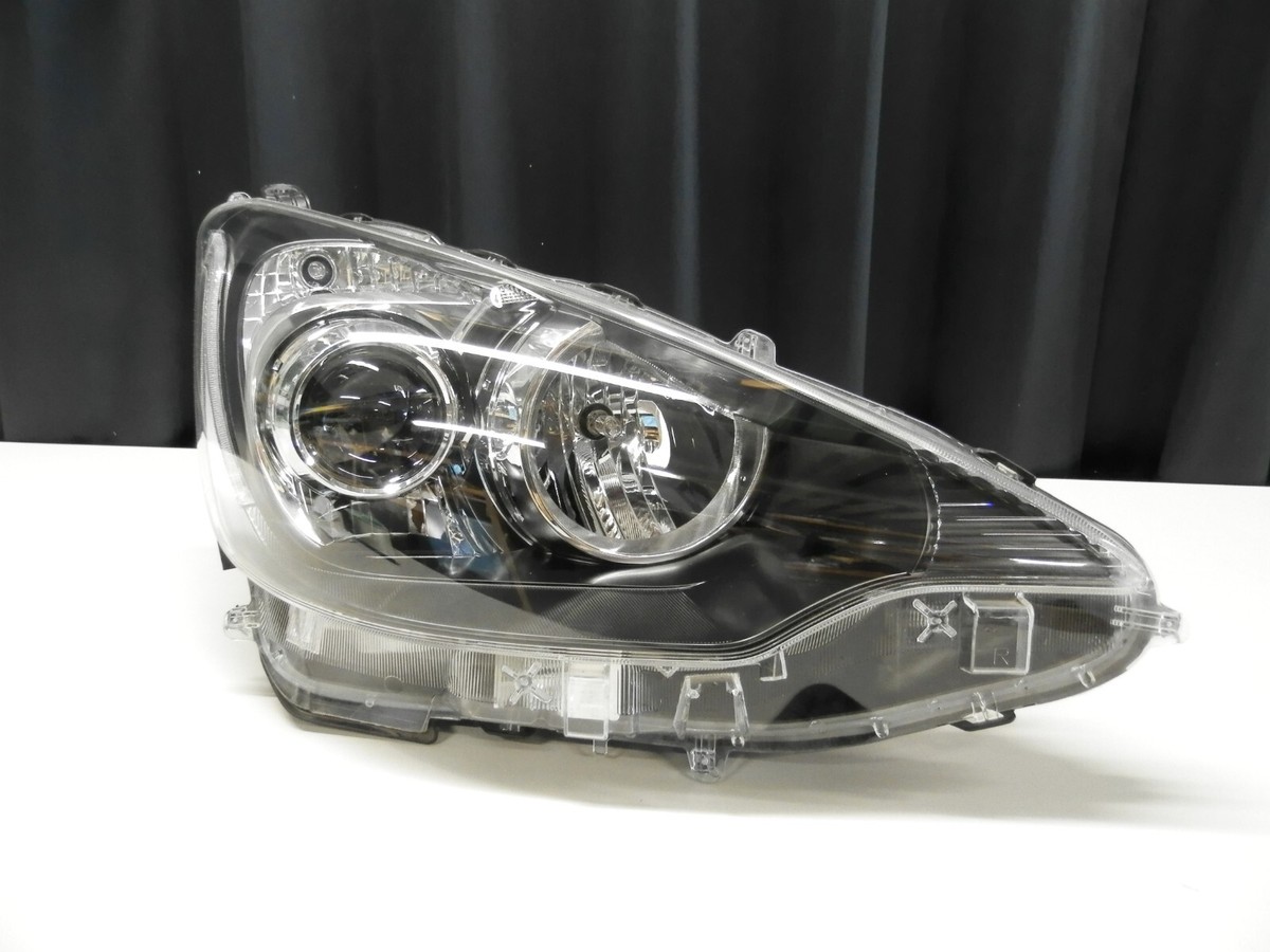 DAA-NHP10アクア左ハロゲンヘッドランプASSY DAA-NHP10アクア左