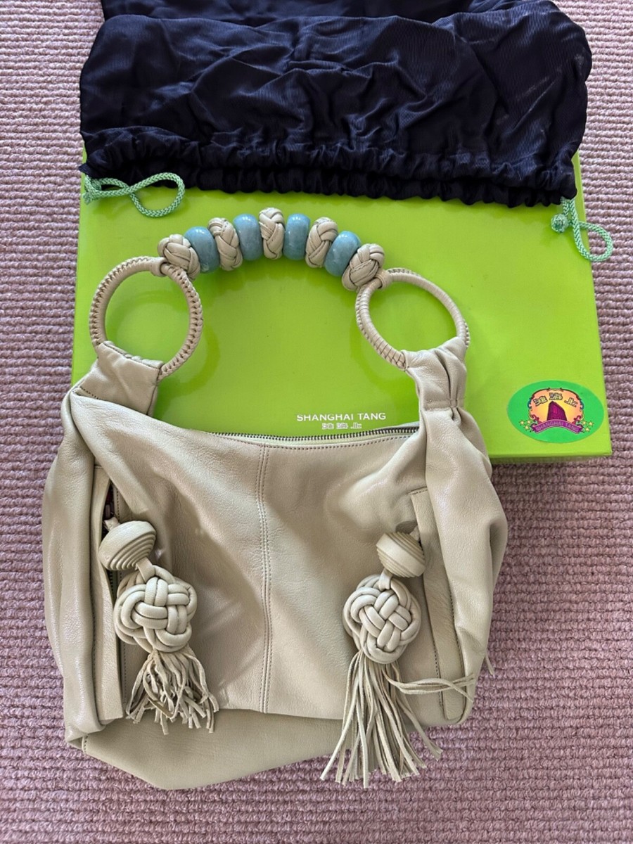 SHANGHAI TANG VINTAGE HANDBAG; LIGHT GREEN LEATHER WITH JADE BEADS
