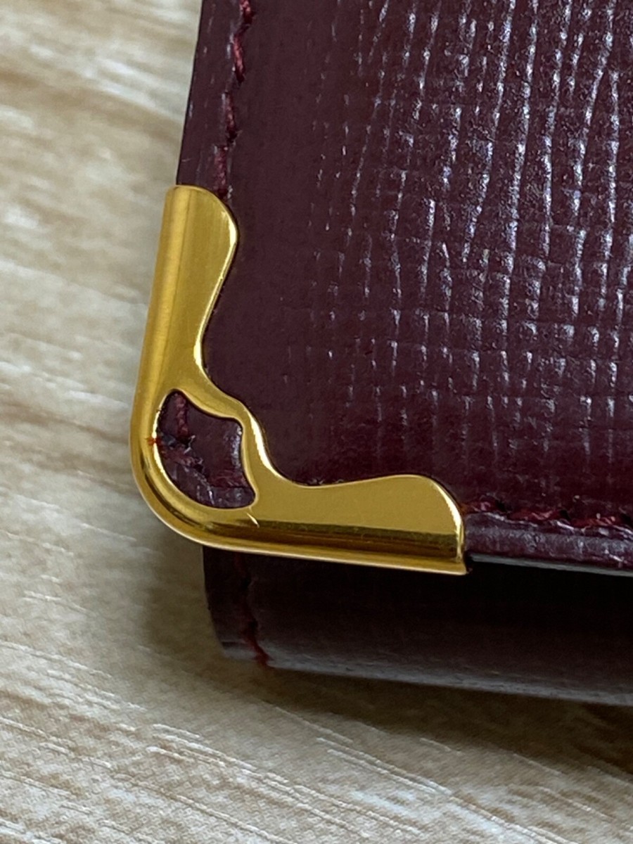 Authentic Cartier leather key holder look unused and in box no