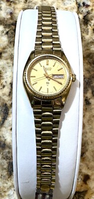 SEIKO QUARTZ JAPAN WOMENS DAY/DATE GOLD TONE BRACELET WATCH 0D0954