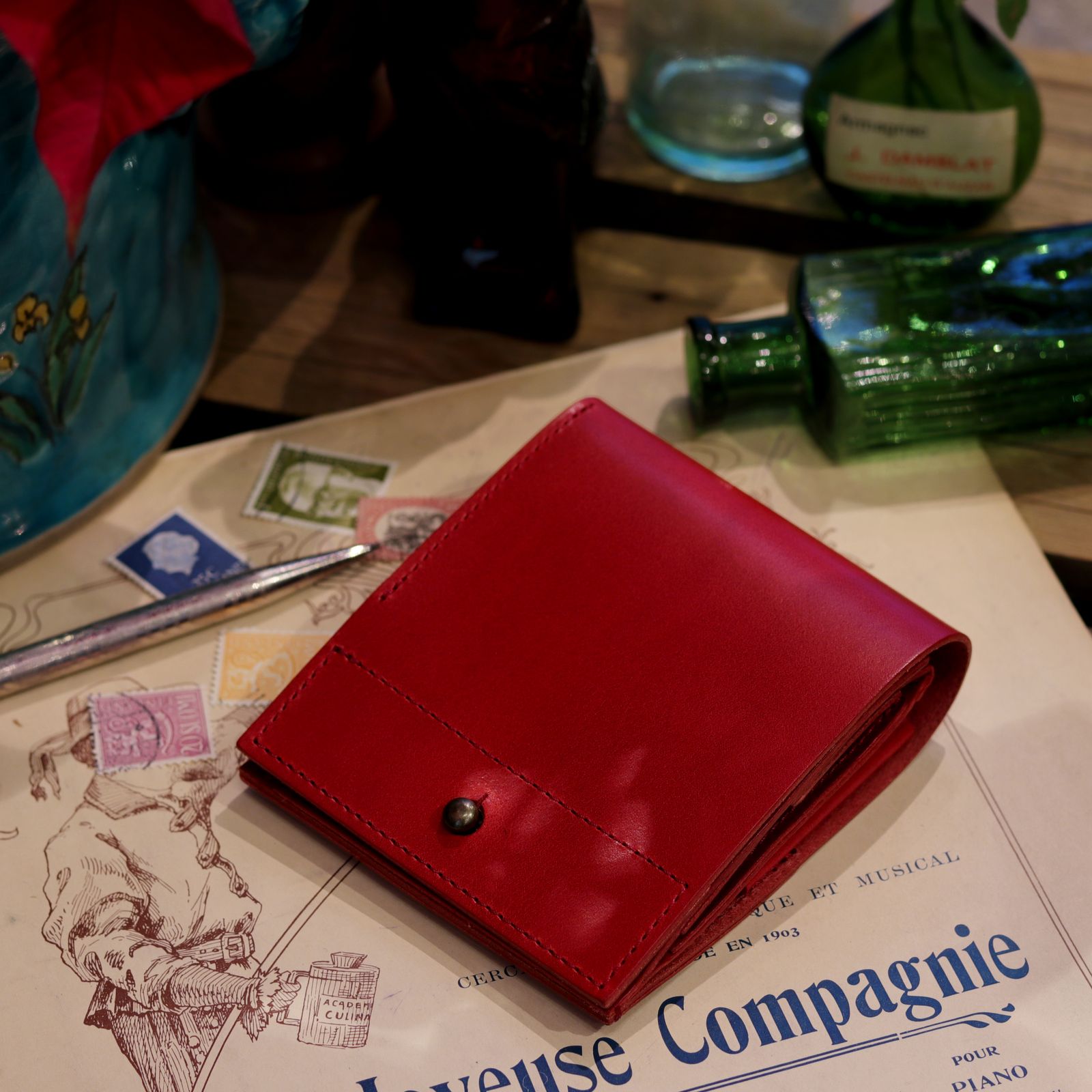 m+ - 「piastra II」2つ折り財布 オルテンシア | corne/コルネ