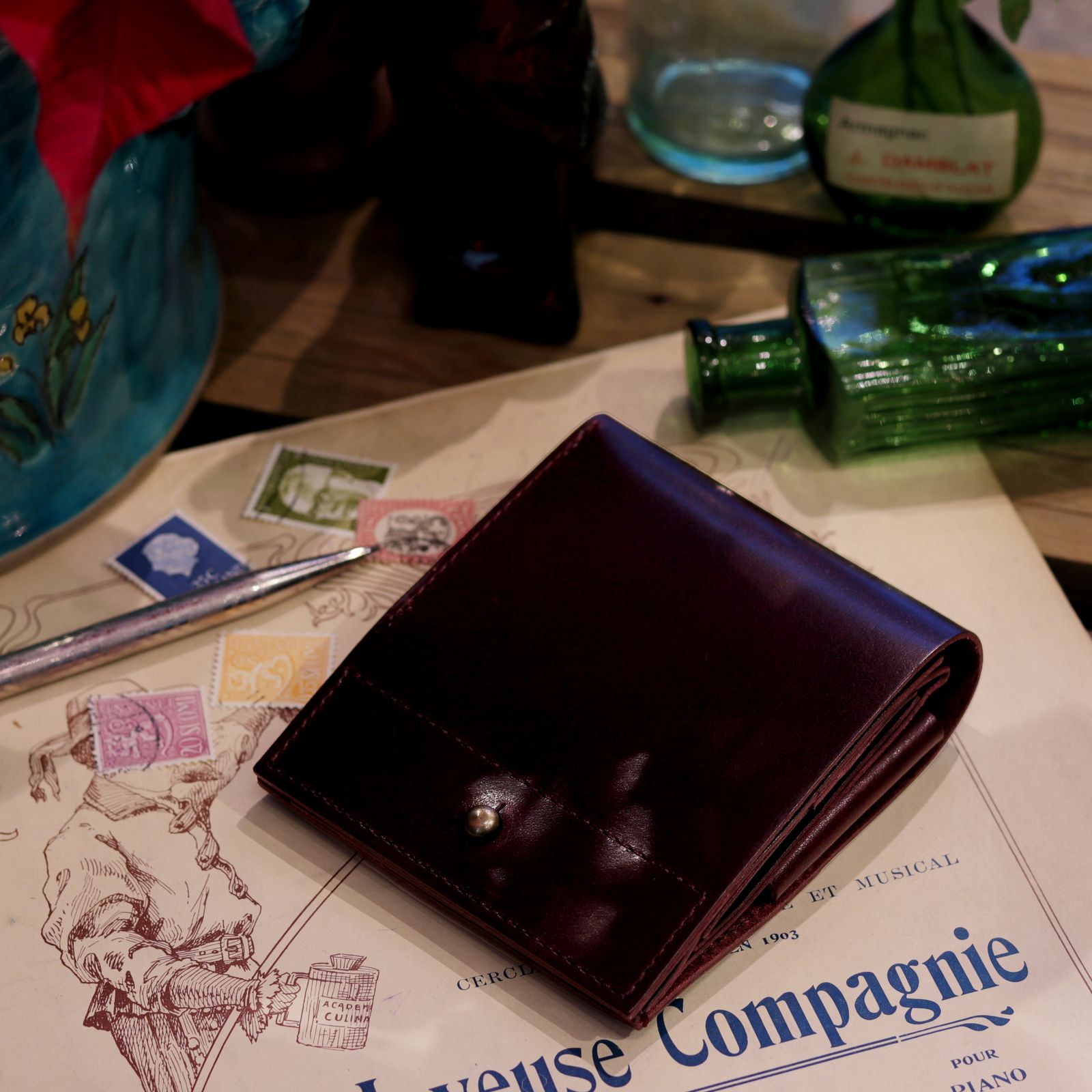 m+ - 「piastra II」2つ折り財布 オルテンシア | corne/コルネ