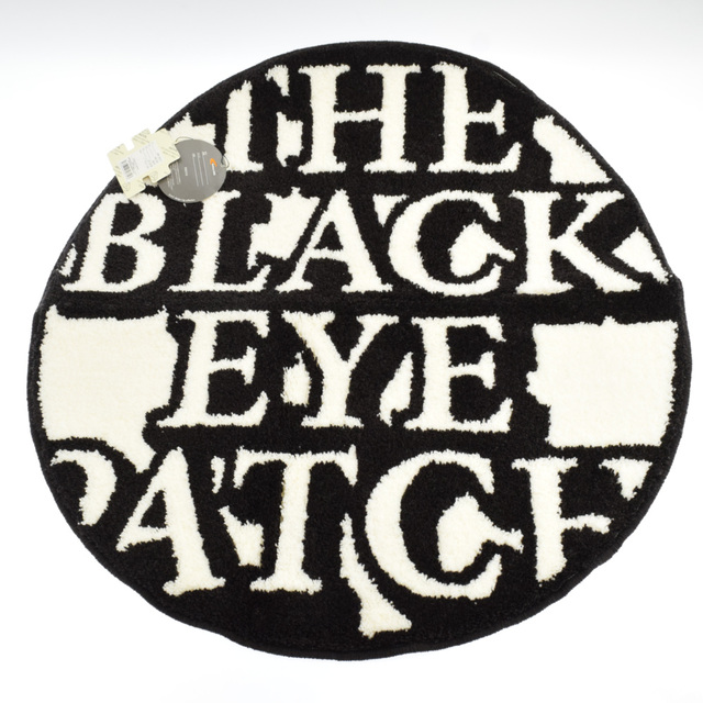 THE BLACK EYE PATCH ブラックアイパッチ LOGO RUG by Garelly 1950