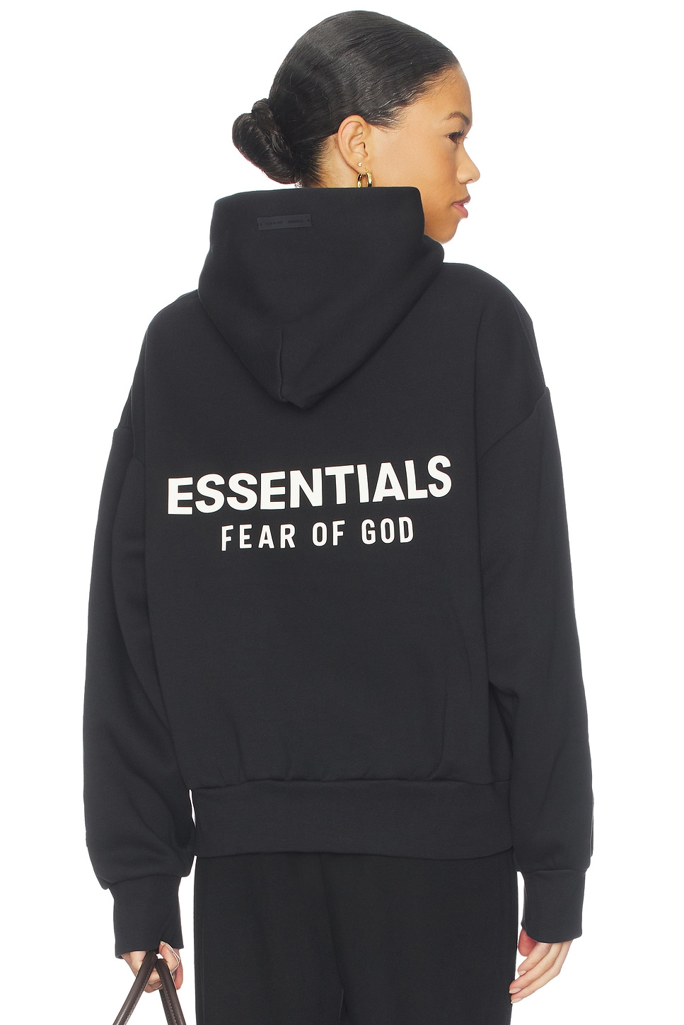 Fear of God ESSENTIALS Fleece Hoodie in Black | REVOLVE