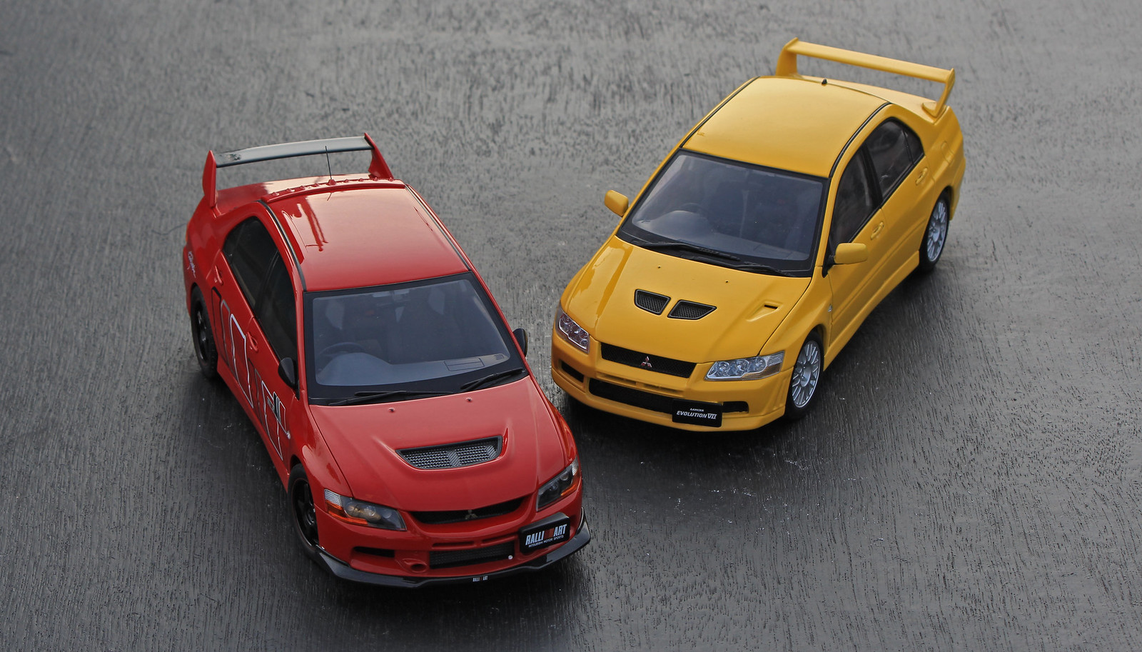 Mitsubishi Lancer Evo VII by Autoart and Evo IX Ralliart by SuperA