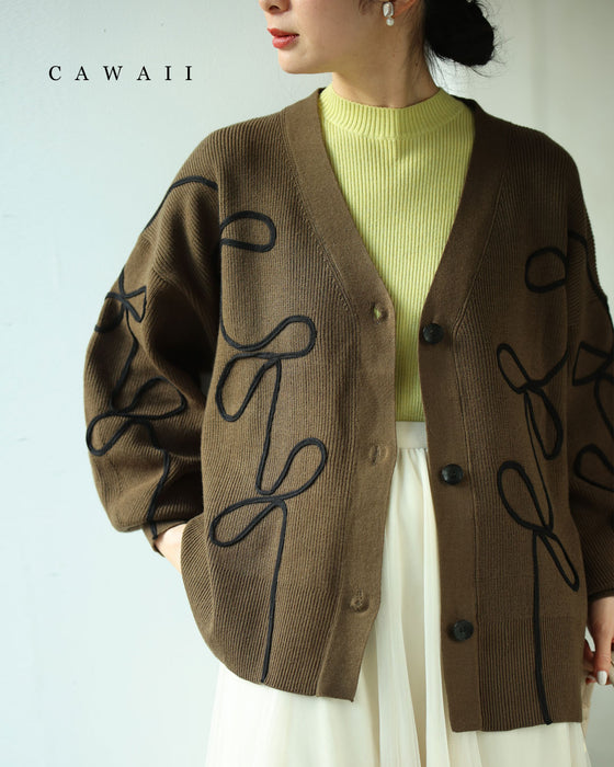 セール商品返品交換不可】ラインが描くリボンのニットカーディガン