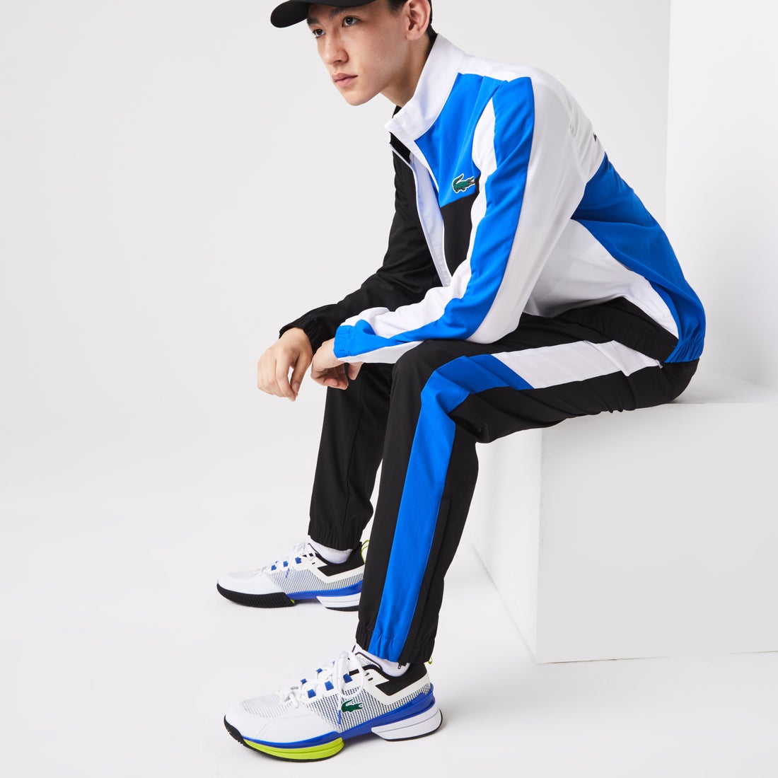 ラコステ LACOSTE アシンメトリーカラーブロックセットアップトラック