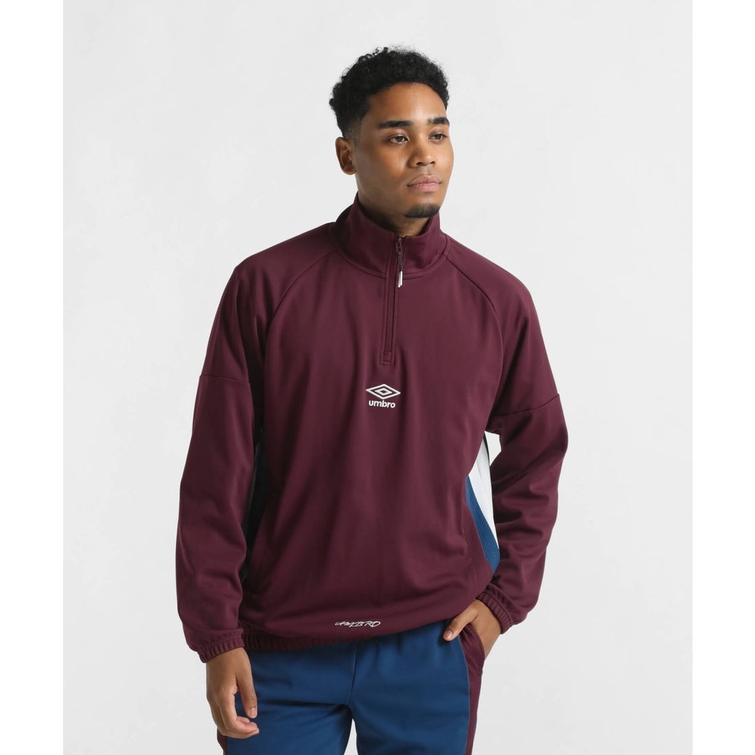 THE THIRD ウォームアップハーフジップトップ｜THE THIRD by umbro