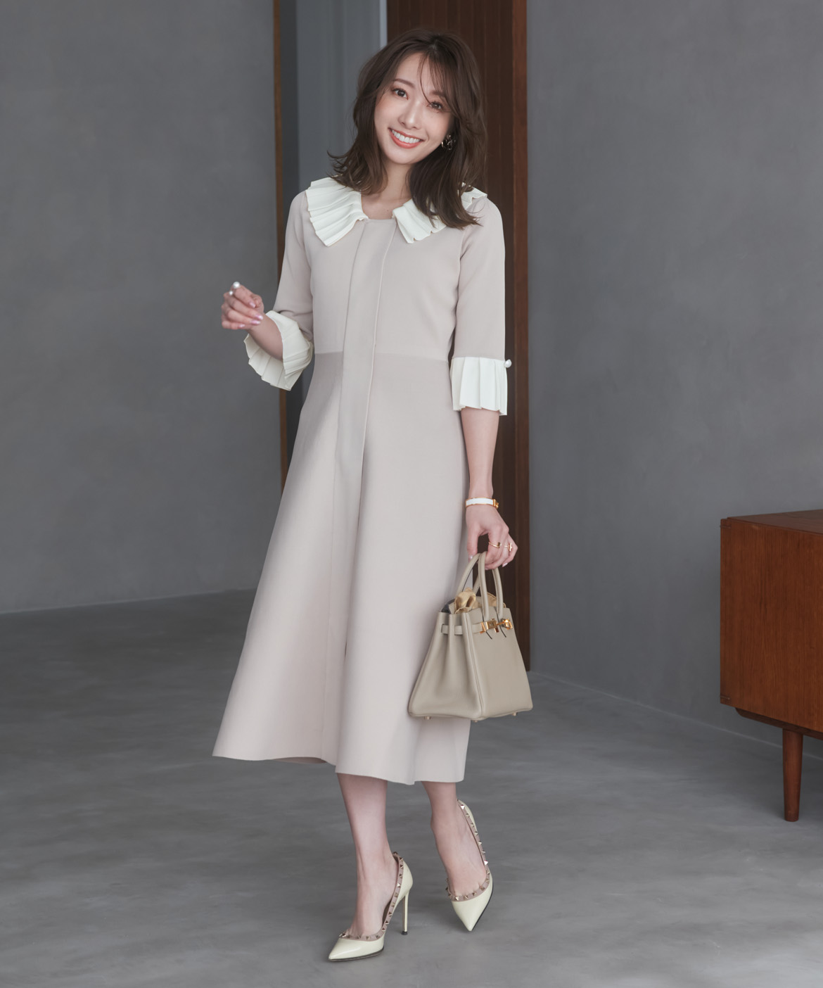 大きいサイズ》華やかプリーツ今どきモードニットワンピース《M Maglie