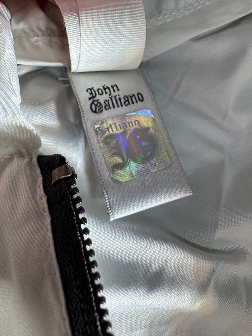John Galliano パーカー beach wear バックプリント - メルカリ