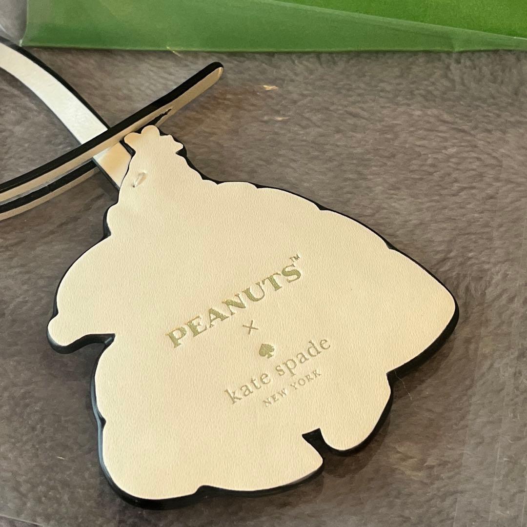 新品＊kate spade ピーナッツ パファー キーフォブ スヌーピー - メルカリ