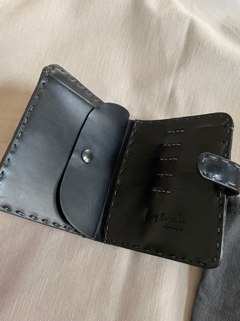 イノマンさま専用 エンリーベグリン 二つ折り財布 黒 - メルカリ