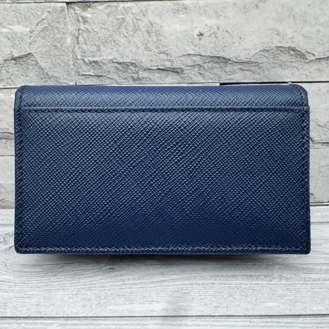 美品】PRADA サフィアーノレザー 名刺入れ リボン ネイビー - メルカリ