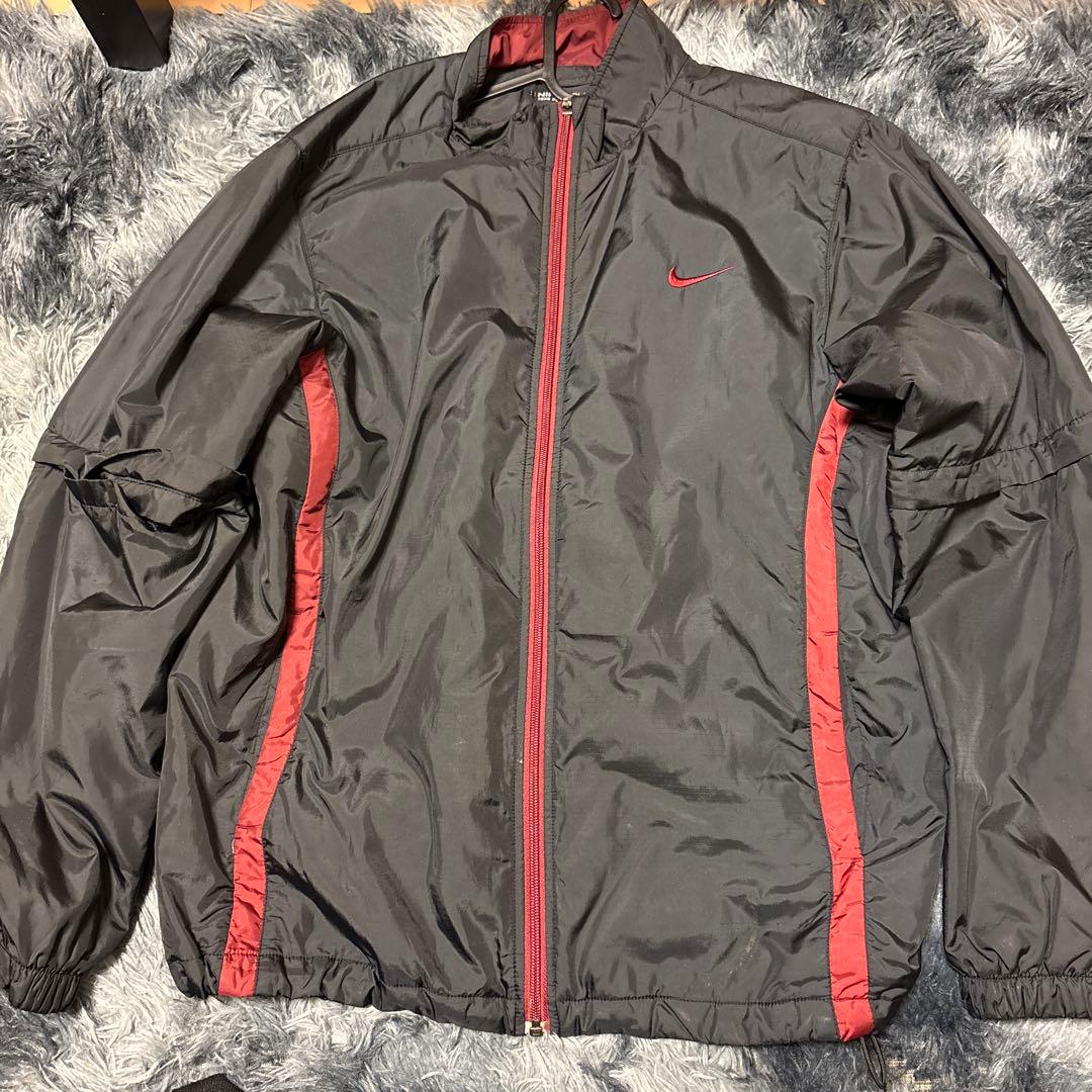 Nike ナイロンジャケット ブラック/レッド - メルカリ
