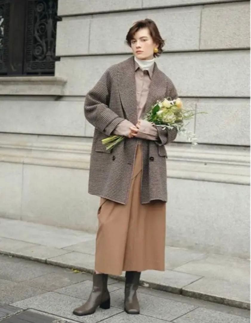 ミラオーウェン 接結ハーフ丈Aラインコート - メルカリ