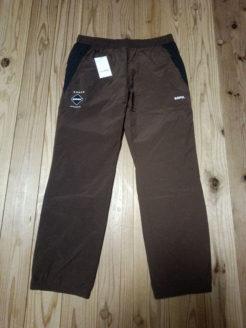 F.C.RealBristolSOPH.ウォームアップパンツブラウンブラックL - メルカリ
