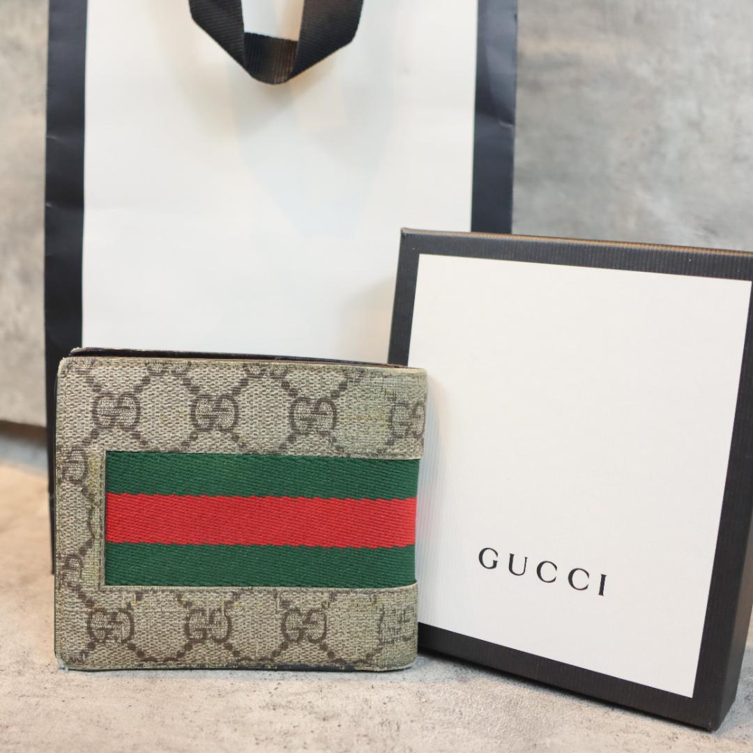 GUCCI グッチ GGスプリーム シェリーライン 二つ折り財布 - メルカリ