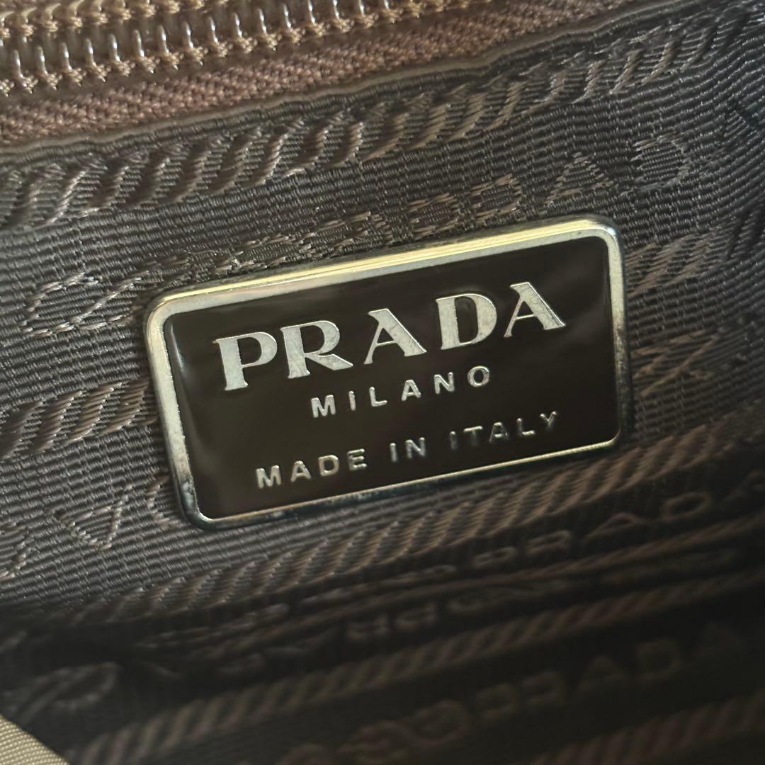 PRADA ナイロン ミニ リュック カーキ 三角 ロゴ ナイロンの通販はau