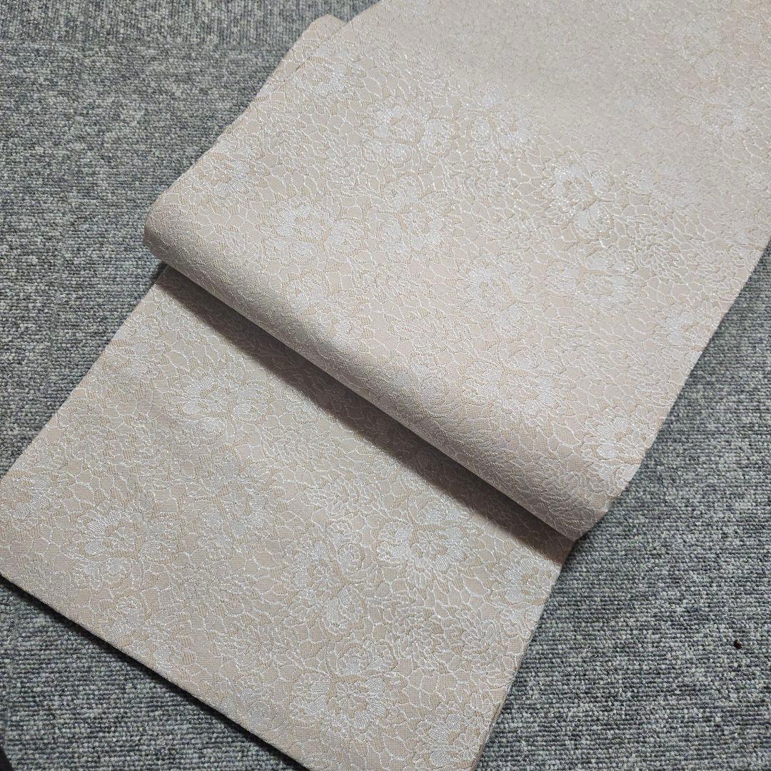 人気くすみカラーベージュ！紋織袋帯 仕立て上がり 全通です。 - メルカリ