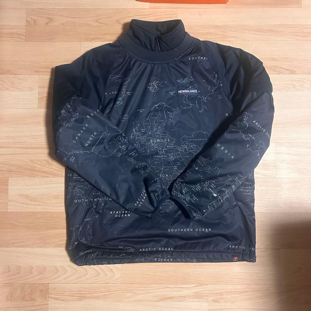 ニューバランスゴルフ 中綿4WAYスニード ネイビー×白地図柄 袖ネック