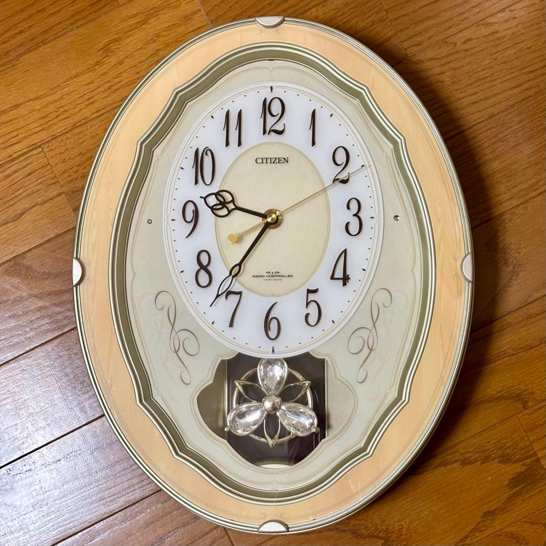 シチズン 電波掛け時計 パルミューズ メロディ 振り子 からくり時計 訳