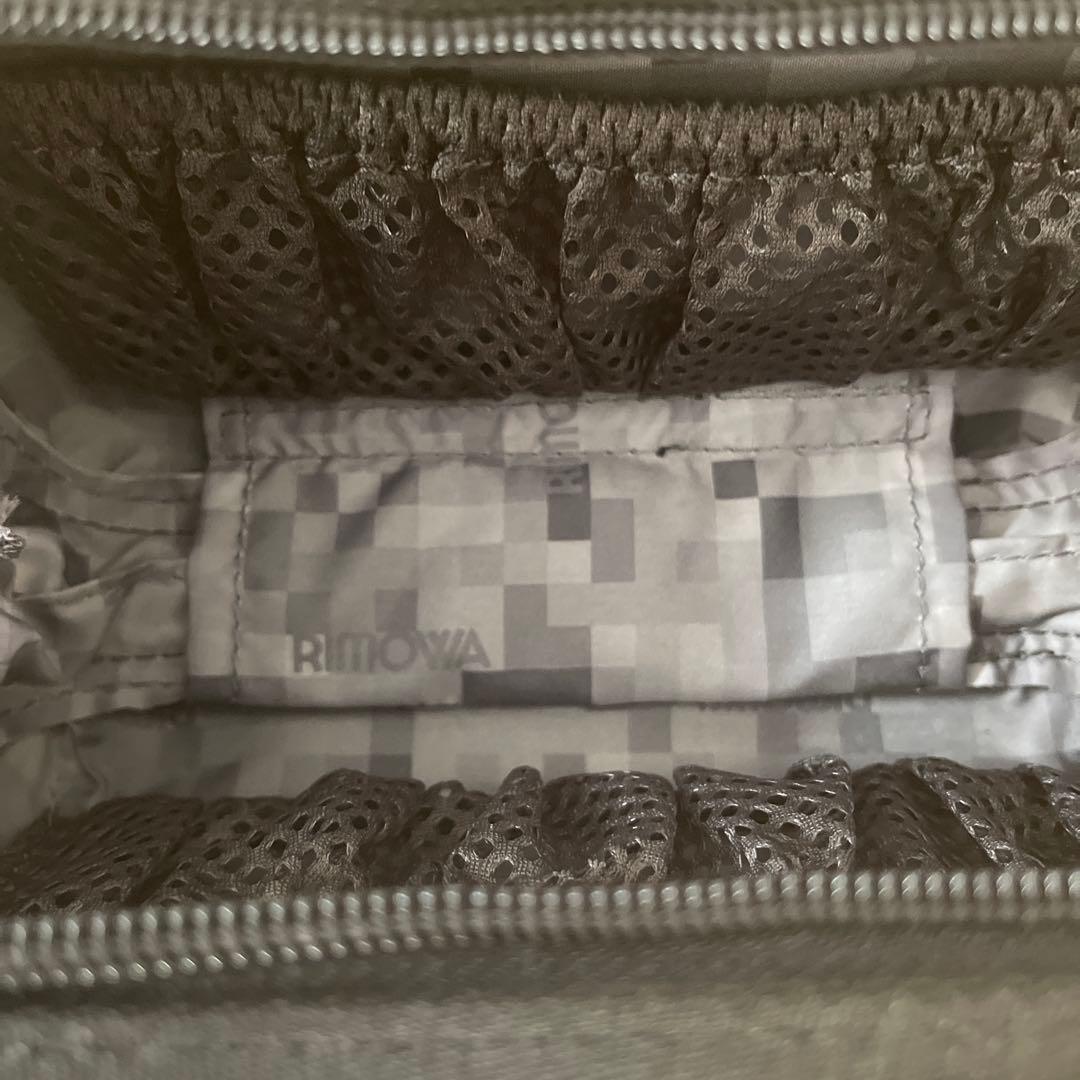 ANAファーストクラスRIMOWA ブラック トラベルポーチ - メルカリ