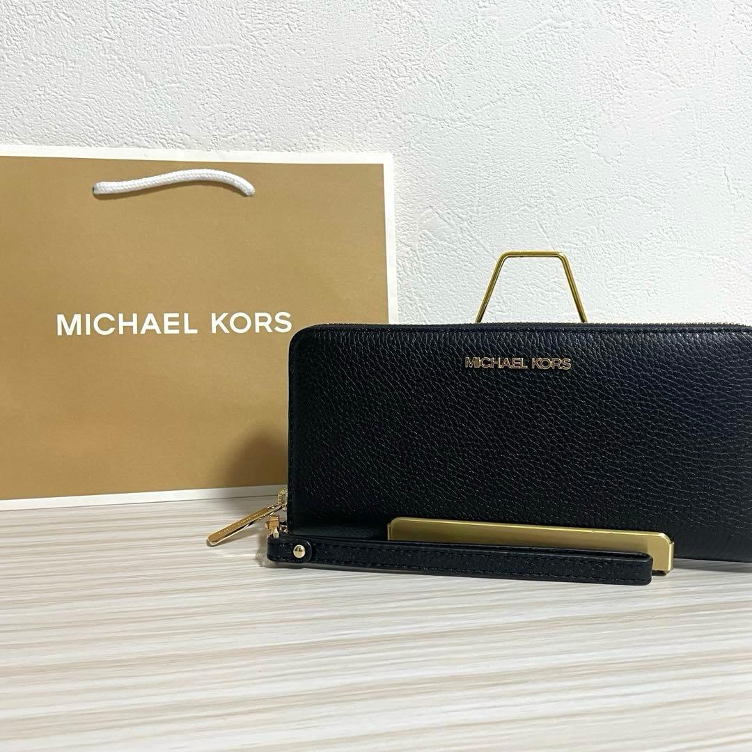新品未使用タグ付】MICHAEL KORS 長財布 アウトレット - メルカリ