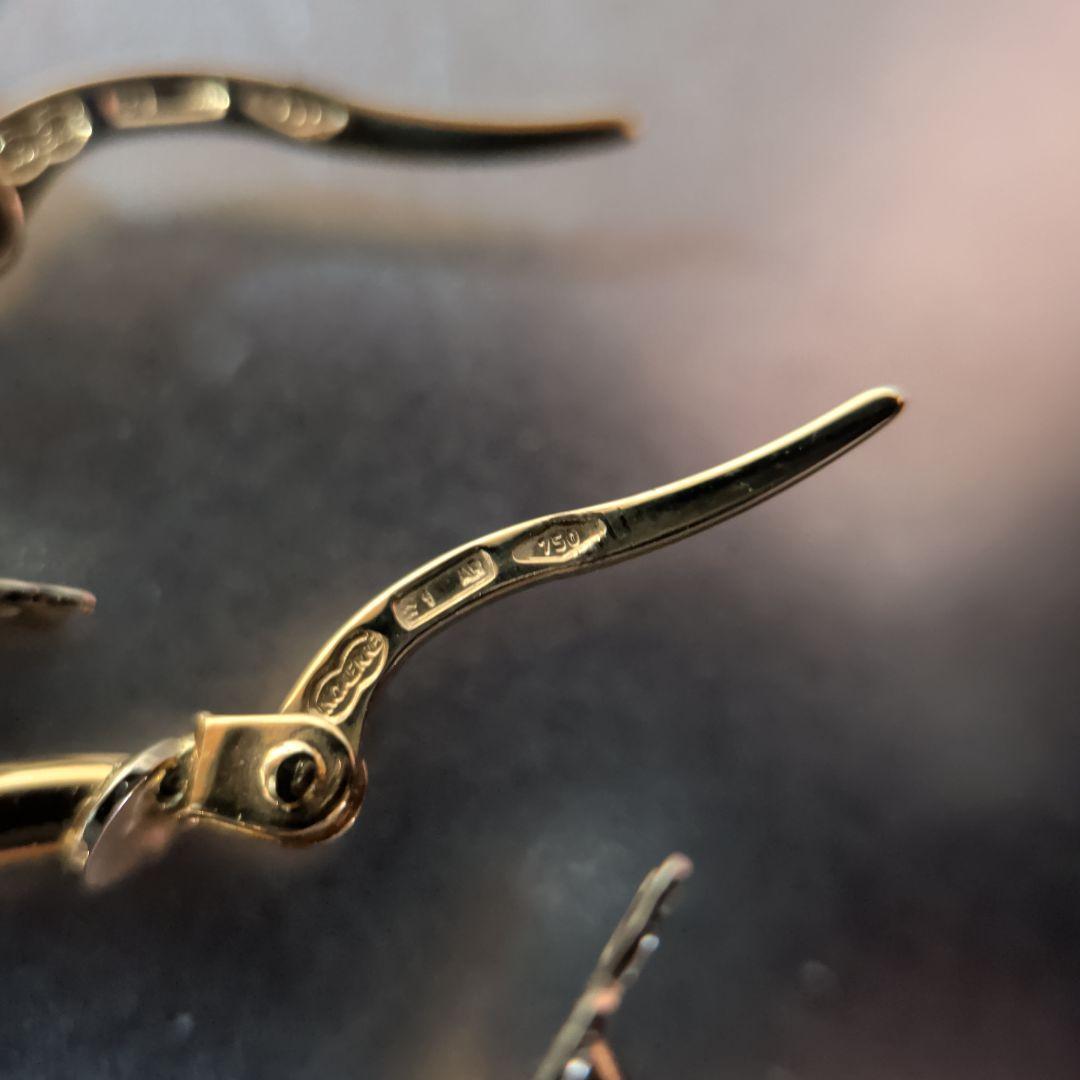 ピアス　UNOAERRE　750　YG　スナップ　ウェーブ　2.59g