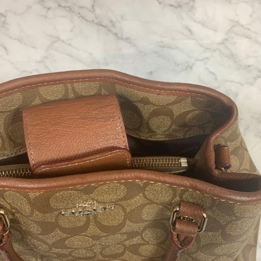 Coach ブラウン トートバッグ ハンドバッグ ブラウンのロゴパターンが