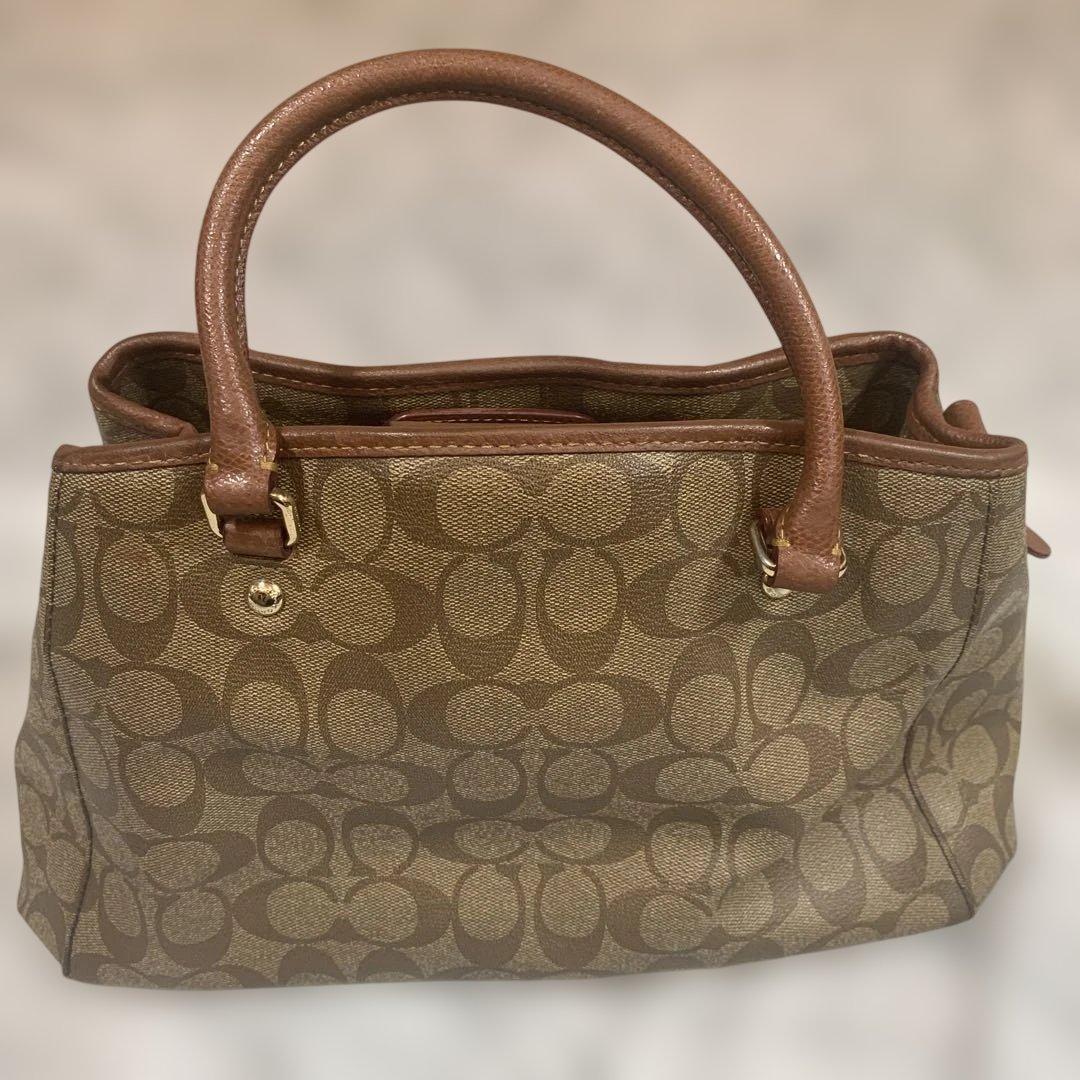 Coach ブラウン トートバッグ ハンドバッグ ブラウンのロゴパターンが