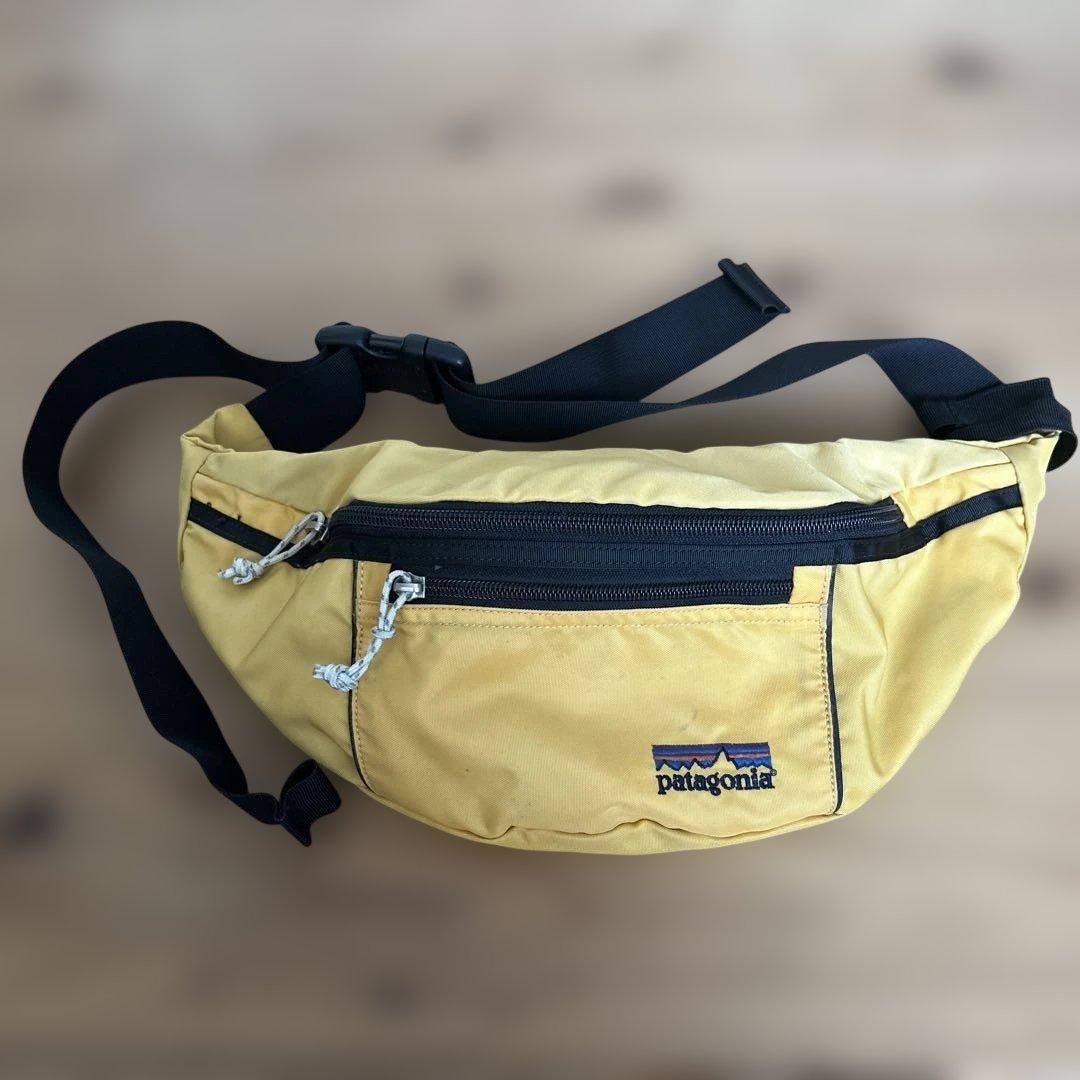 patagonia ボディバッグ イエロー - メルカリ