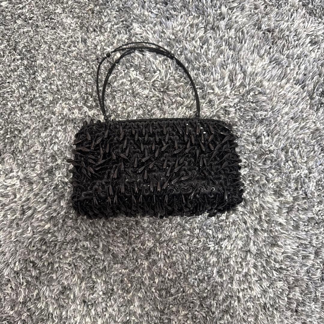 ビーズ装飾 黒 パーティーバッグ - メルカリ