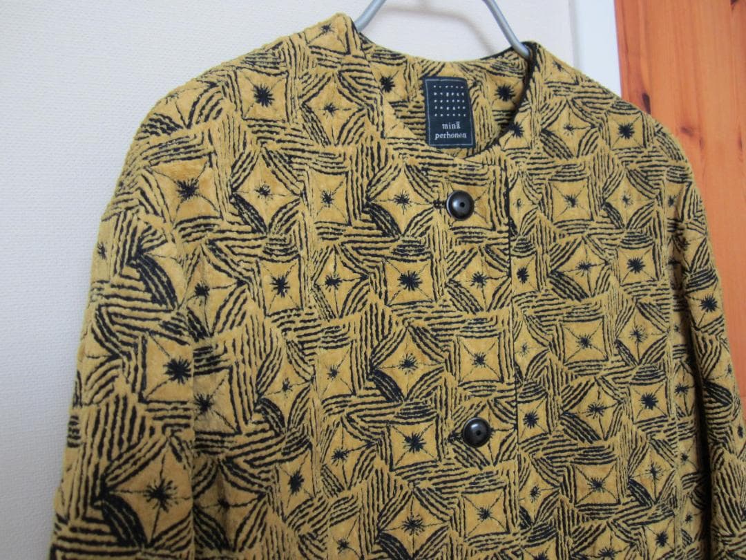 ミナペルホネン フラワーサークル ノーカラーロングコート 38 黄