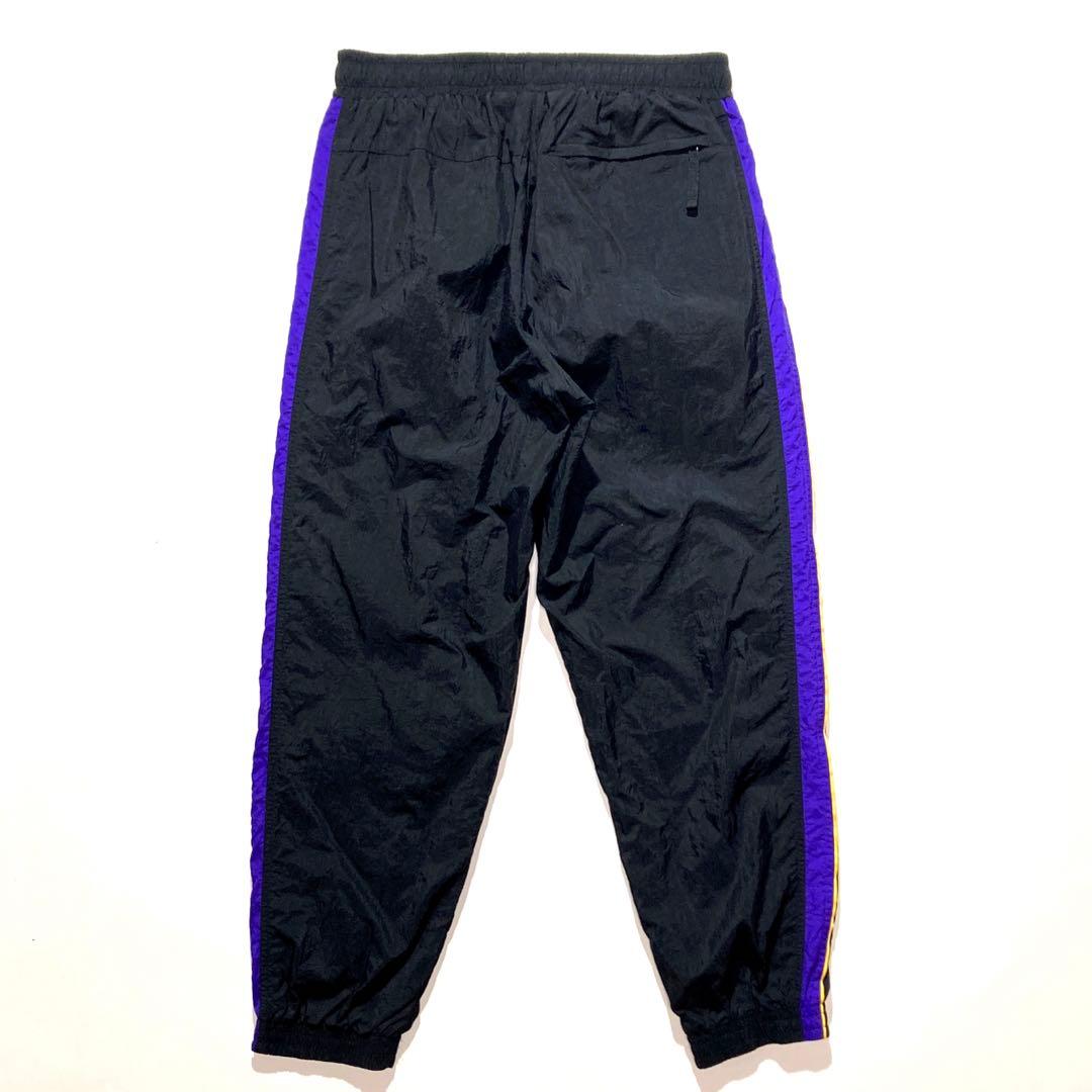 NIKE LAKERS ナイロン トラックパンツ L 黒 紫 黄色 NBA - メルカリ