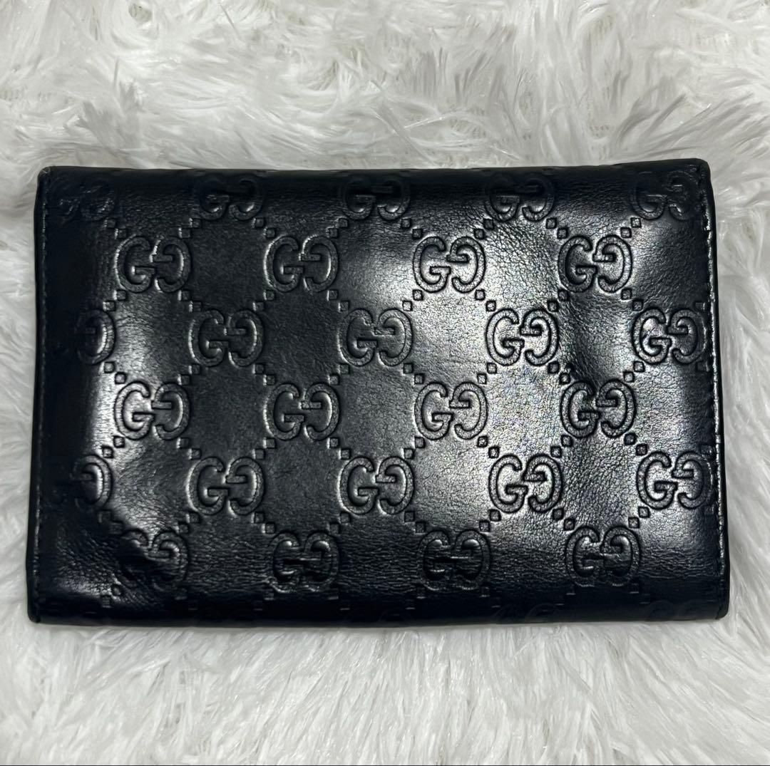 GUCCI GG シマ 3つ折り財布 エンボスロゴ - メルカリ
