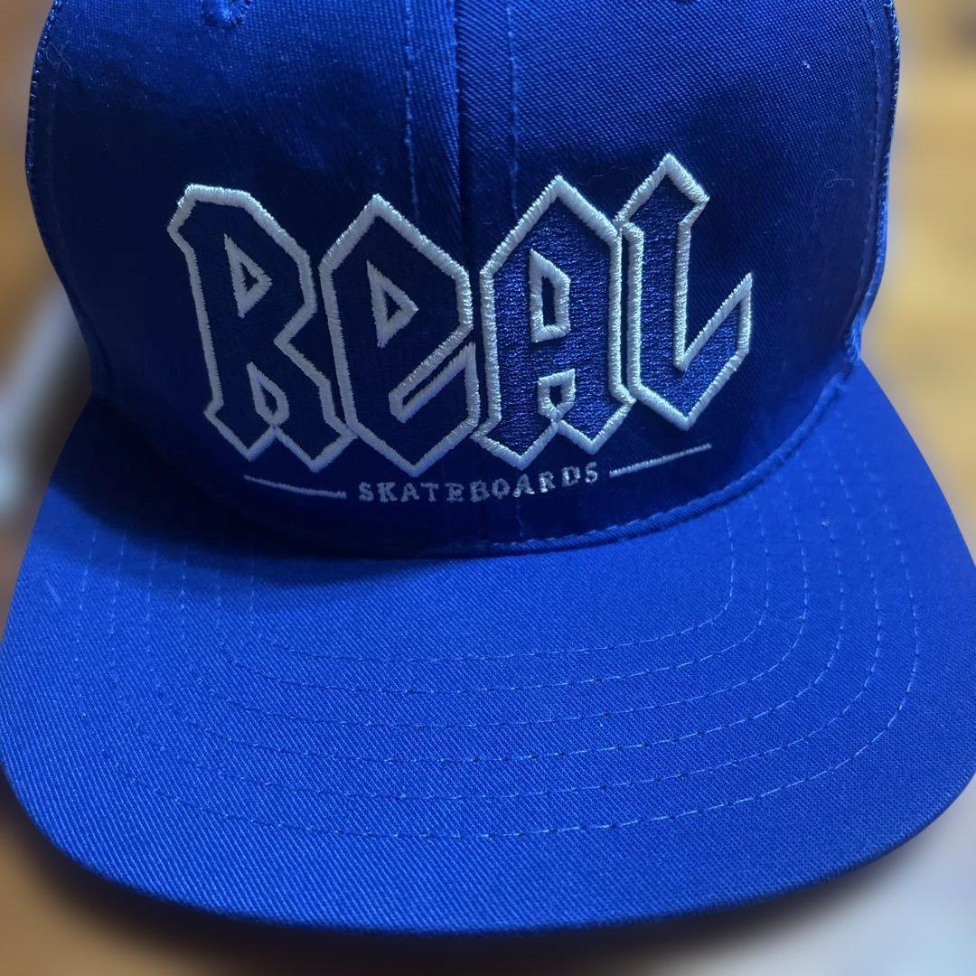 REAL SKATEBOARDS 青 スナップバックキャップ - メルカリ
